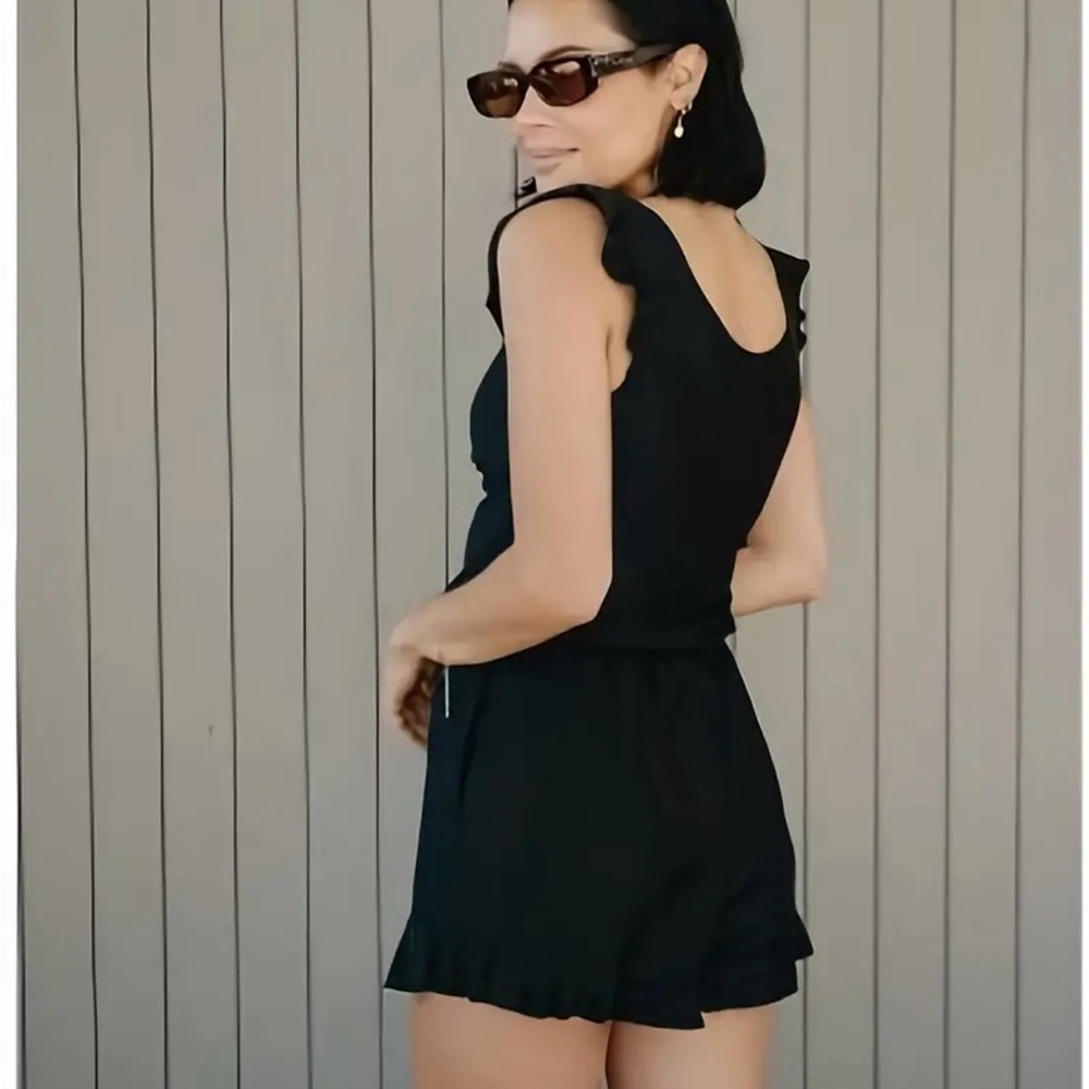 Women’s black swim romper